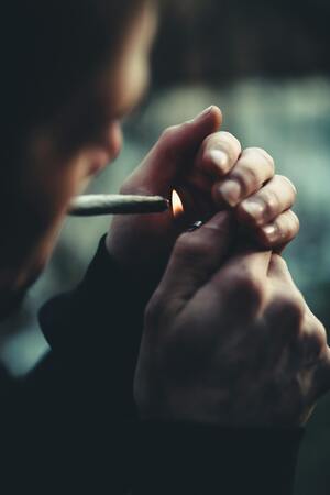 Persona fumando